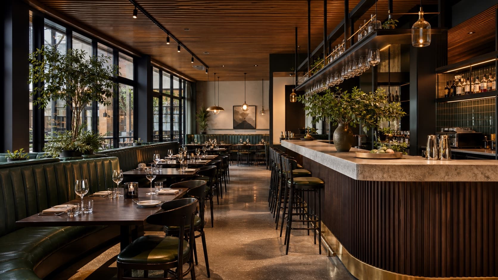 Restaurant fitout with dining banquettes, a feature bar, and warm timber finishes